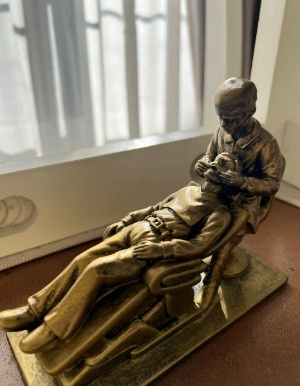 Dental Sculpture, A Male Dentist Working on a Patient