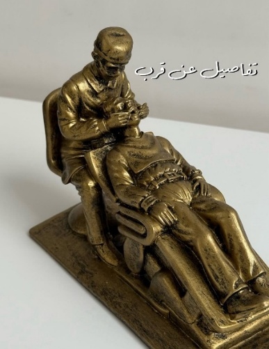 Dental Sculpture, A Male Dentist Working on a Patient